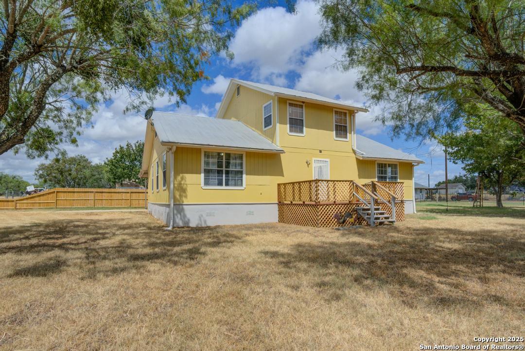 1176 Old Adams Lane Pleasanton, TX 78064 - Photo 1 of 42 a view of a house with a yard