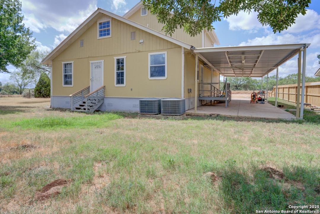 1176 Old Adams Lane Pleasanton, TX 78064 - Photo 29 of 42 a view of a house with a yard