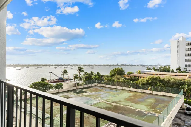 a view of a swimming pool with a lake view