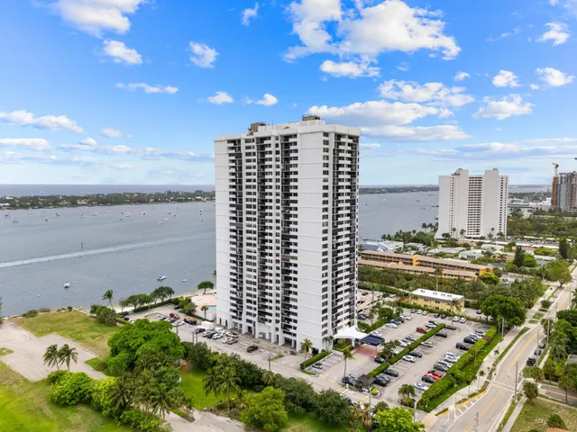 an aerial view of a house with a swimming pool