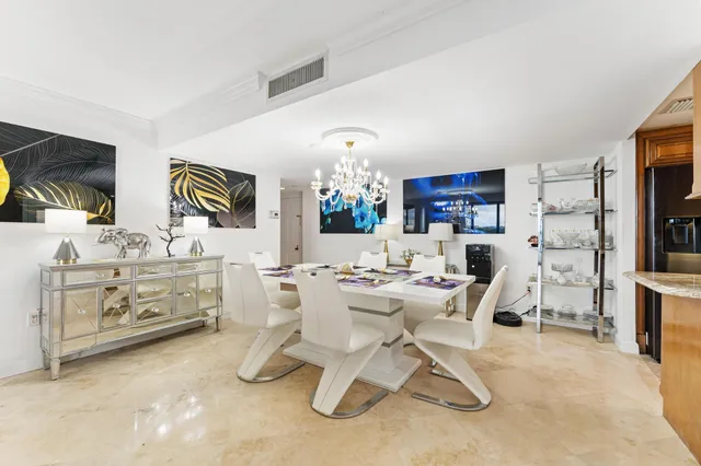 a view of a dining room kitchen and a window