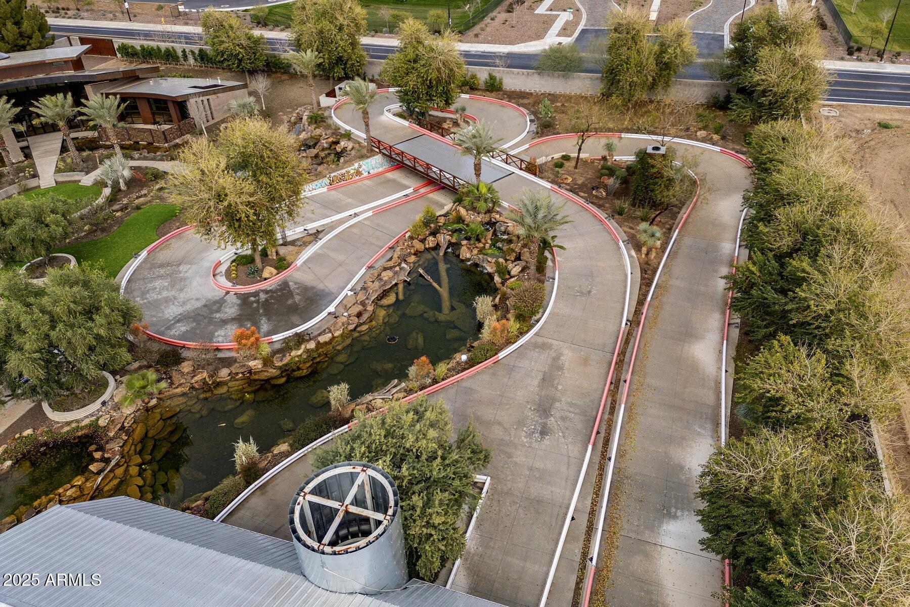 21423 South 147th Street Gilbert, AZ 85298 - Photo 148 of 169 an aerial view of a house with a yard and large trees