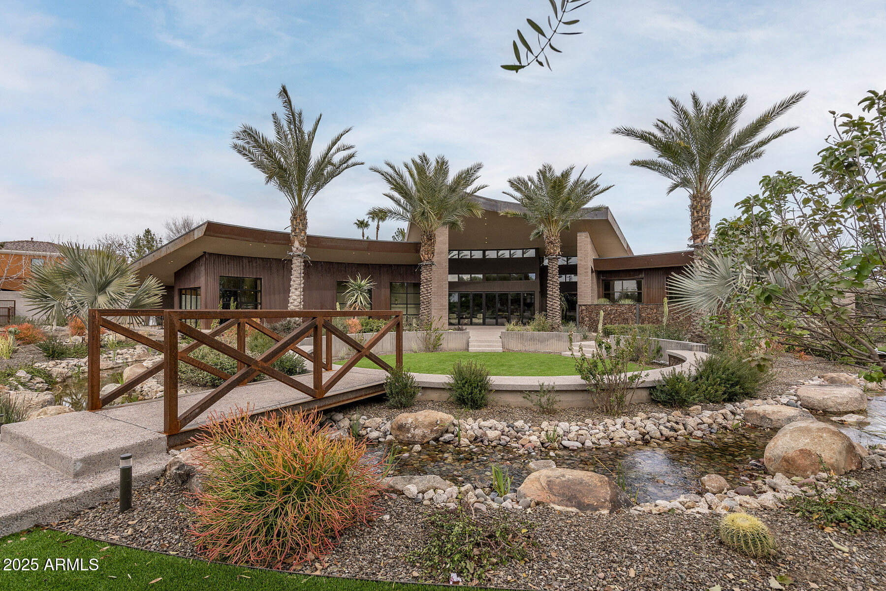 21423 South 147th Street Gilbert, AZ 85298 - Photo 69 of 169 front view of a house with a yard and potted plants
