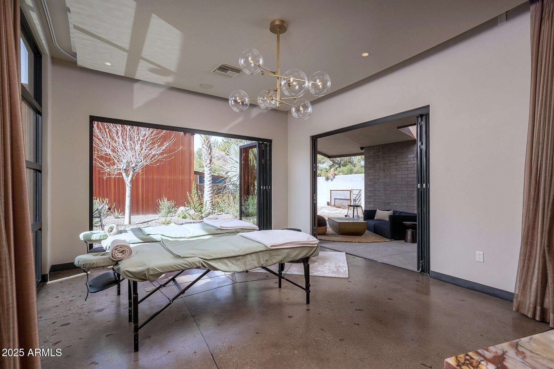 21423 South 147th Street Gilbert, AZ 85298 - Photo 76 of 169 a living room with furniture and a large window