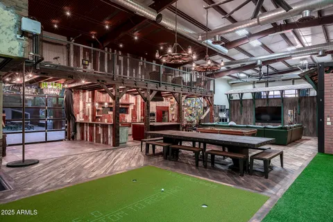 a room with gym equipment and a large window