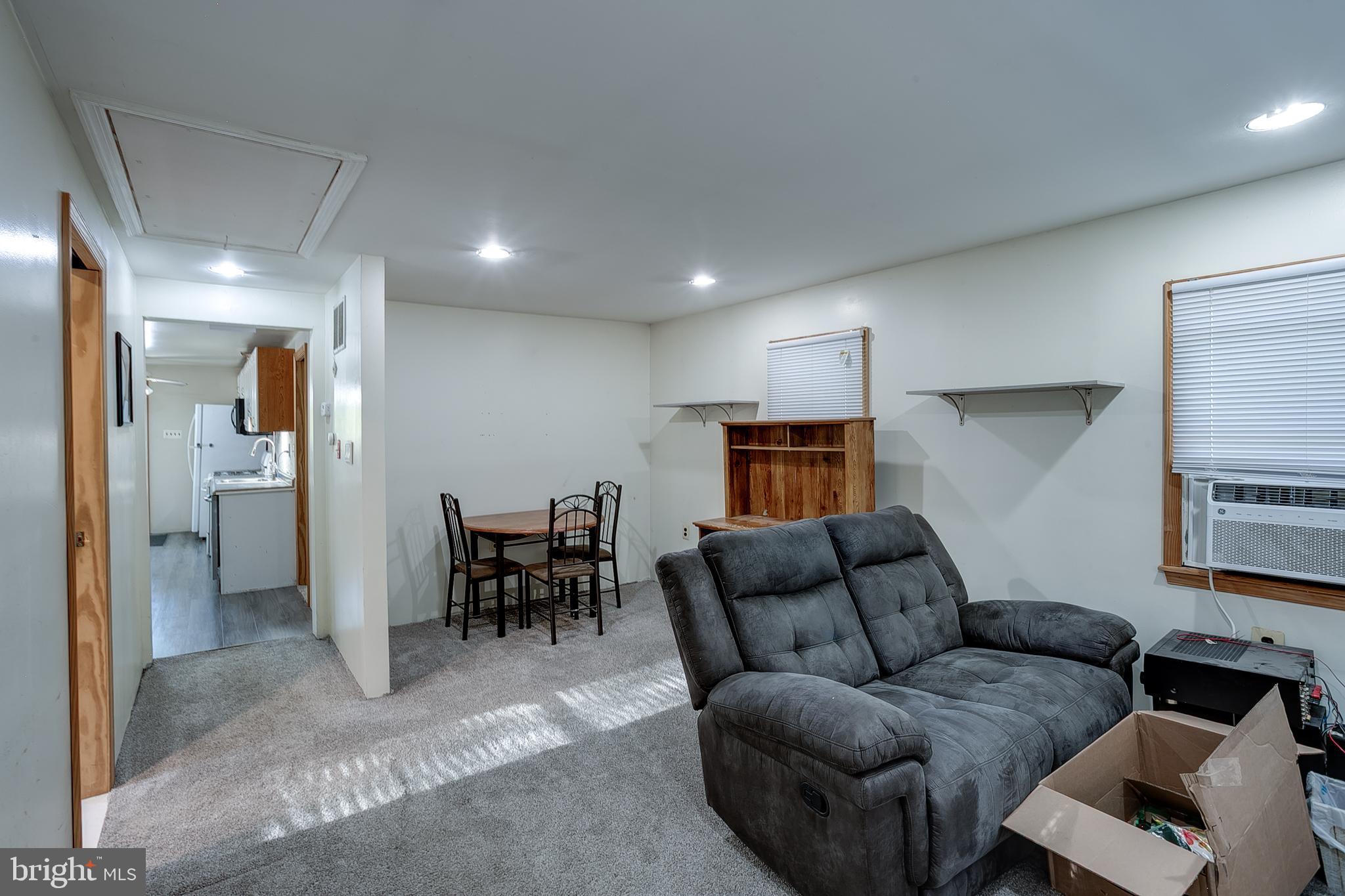 111 Carson Road Southampton, NJ 08088 - Photo 4 of 14 a living room with furniture and a couch