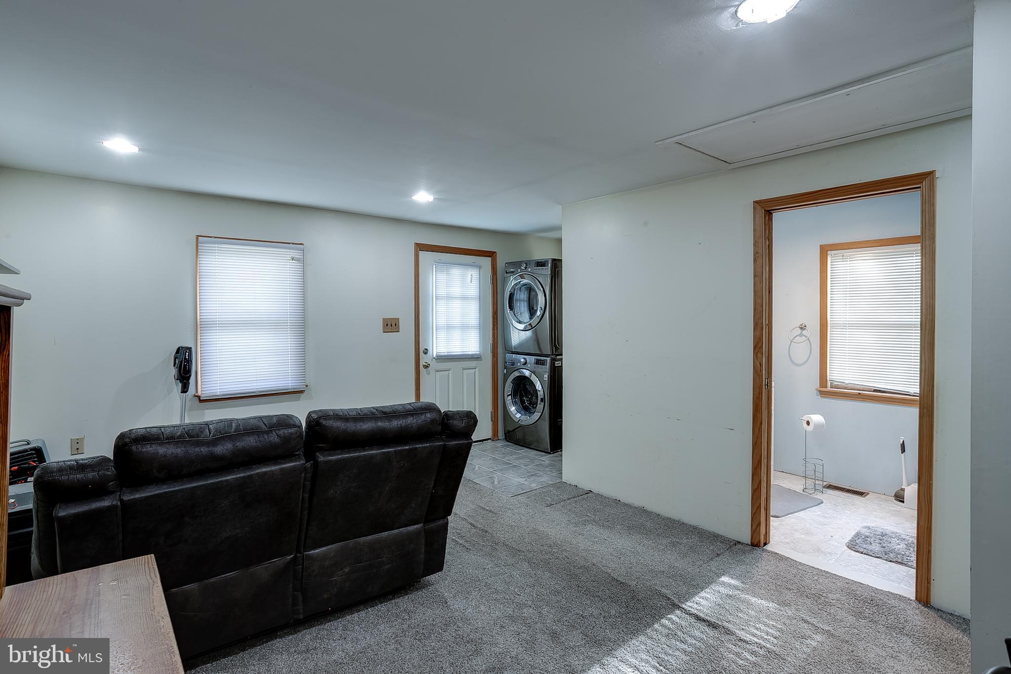 111 Carson Road Southampton, NJ 08088 - Photo 5 of 14 a living room with furniture and a window