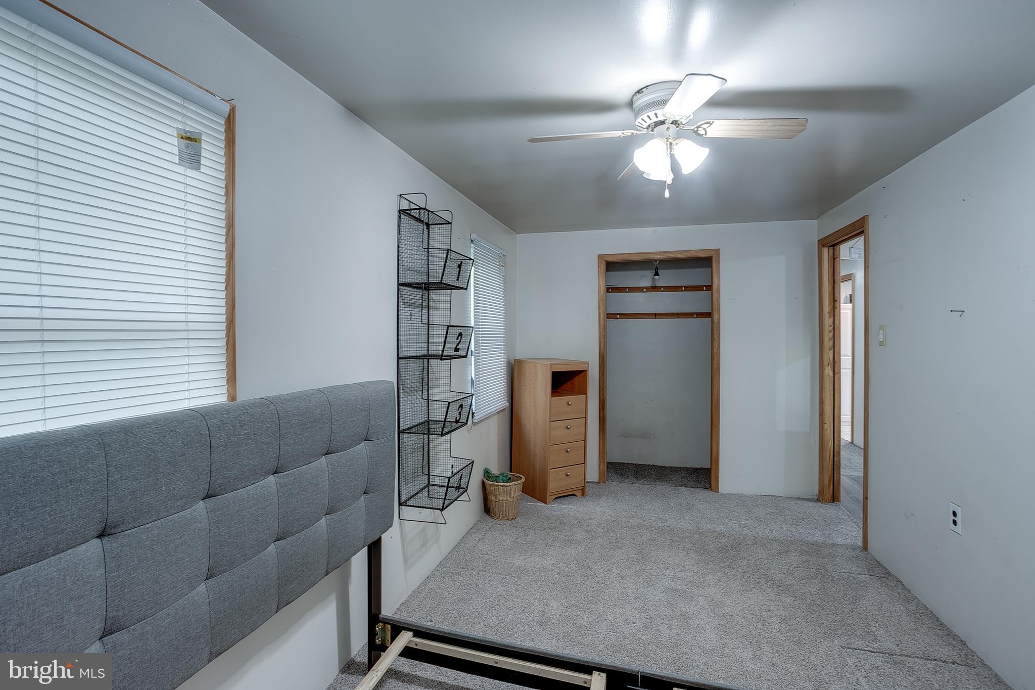 111 Carson Road Southampton, NJ 08088 - Photo 8 of 14 a living room with furniture and chandelier