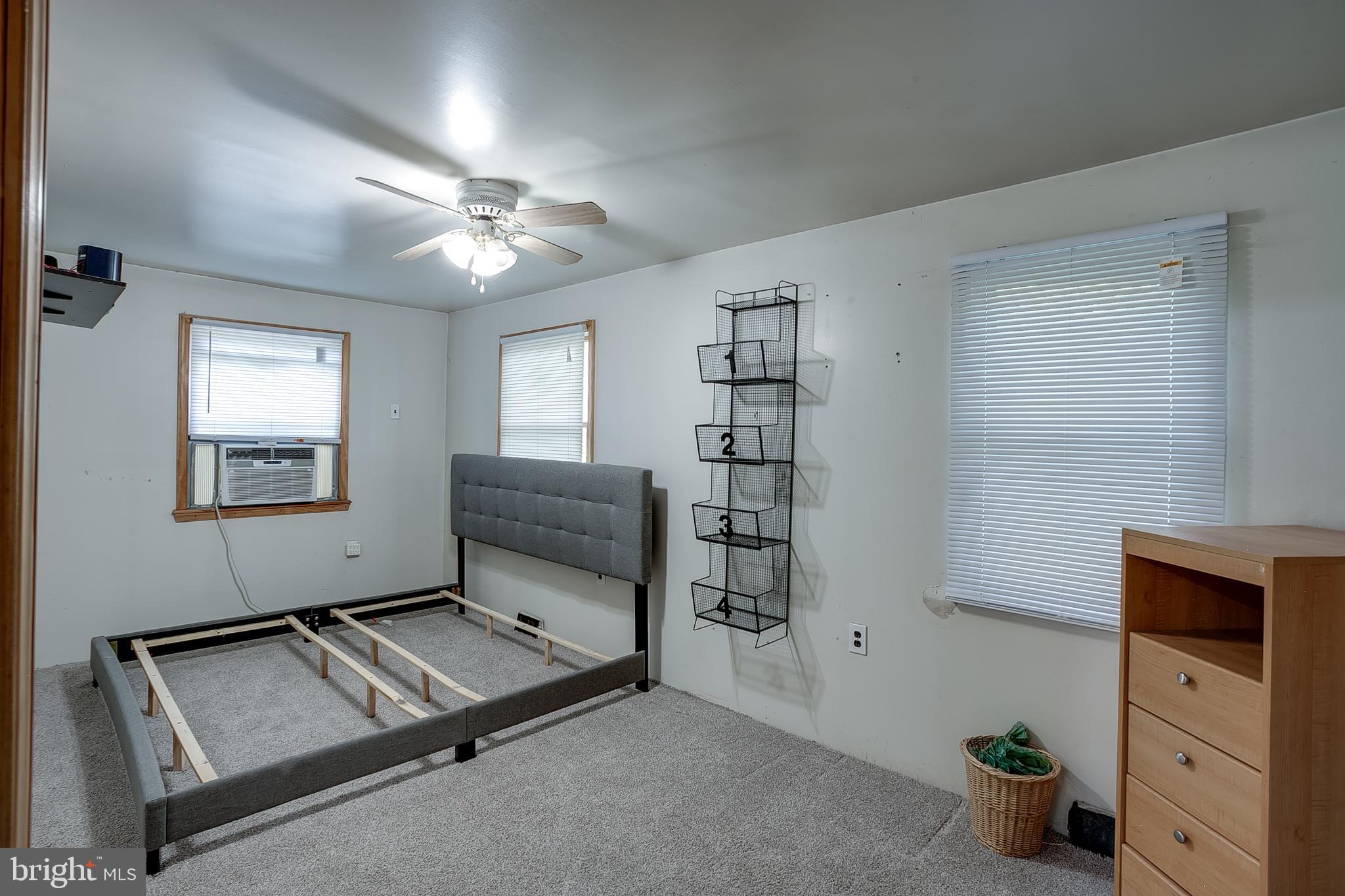 111 Carson Road Southampton, NJ 08088 - Photo 9 of 14 a living room with furniture gym equipment and a window