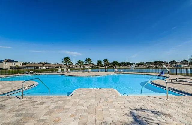 an aerial view of a swimming pool