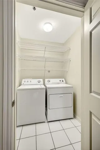 a lamp on a table in a mirror