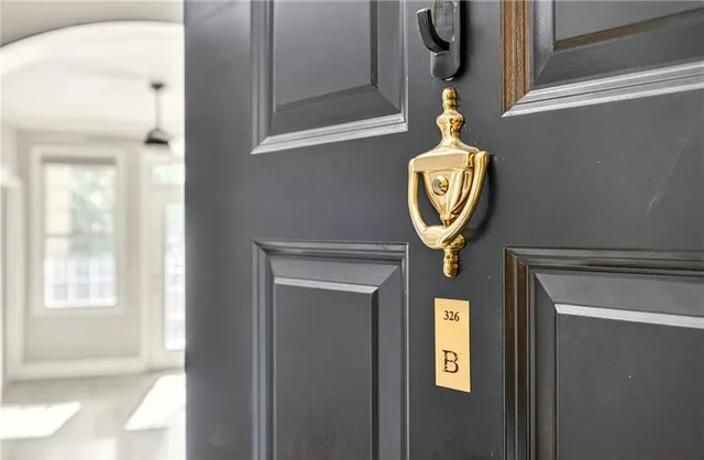 a bathroom with a sink a mirror and shower