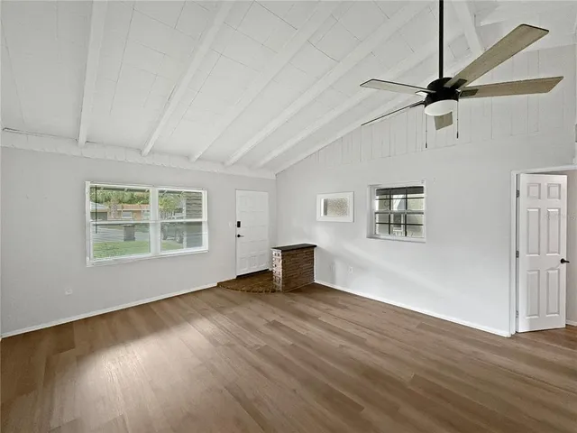 a kitchen with stainless steel appliances a refrigerator sink and cabinets