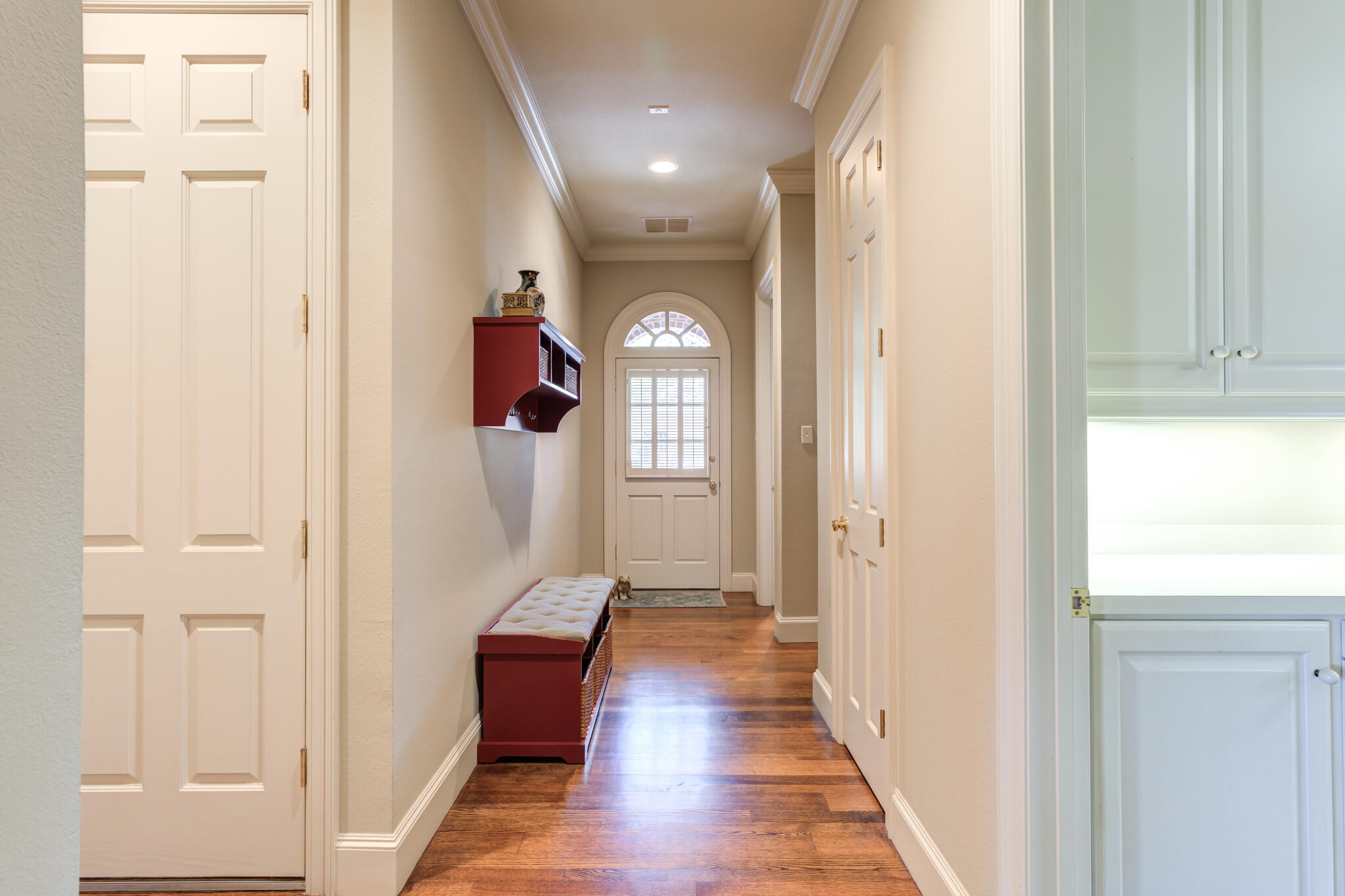9108 Salem Drive Lubbock, TX 79424 - Photo 67 of 110 a view of a hallway with wooden floor and entryway