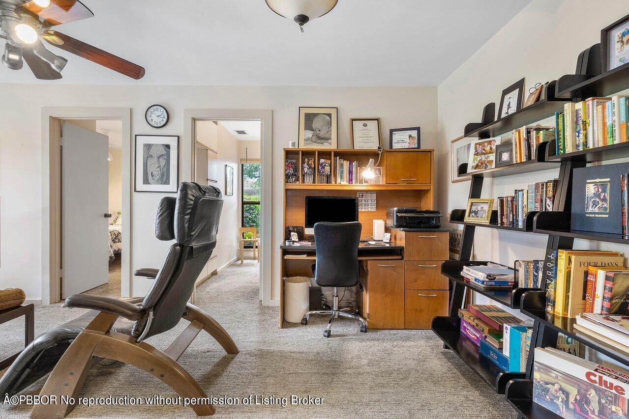 1111 Southwest 19th Street Boca Raton, FL 33486 - Photo 14 of 37 a view of a livingroom with furniture and a flat screen tv