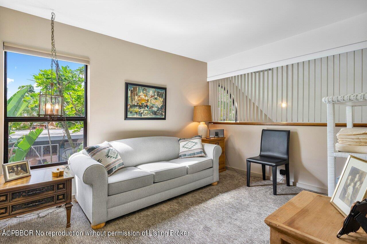 1111 Southwest 19th Street Boca Raton, FL 33486 - Photo 20 of 37 a living room with furniture and a window