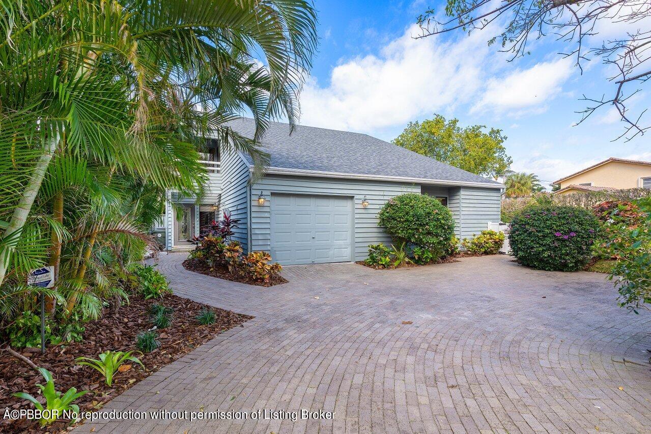 1111 Southwest 19th Street Boca Raton, FL 33486 - Photo 2 of 37 a view of a backyard with potted plants