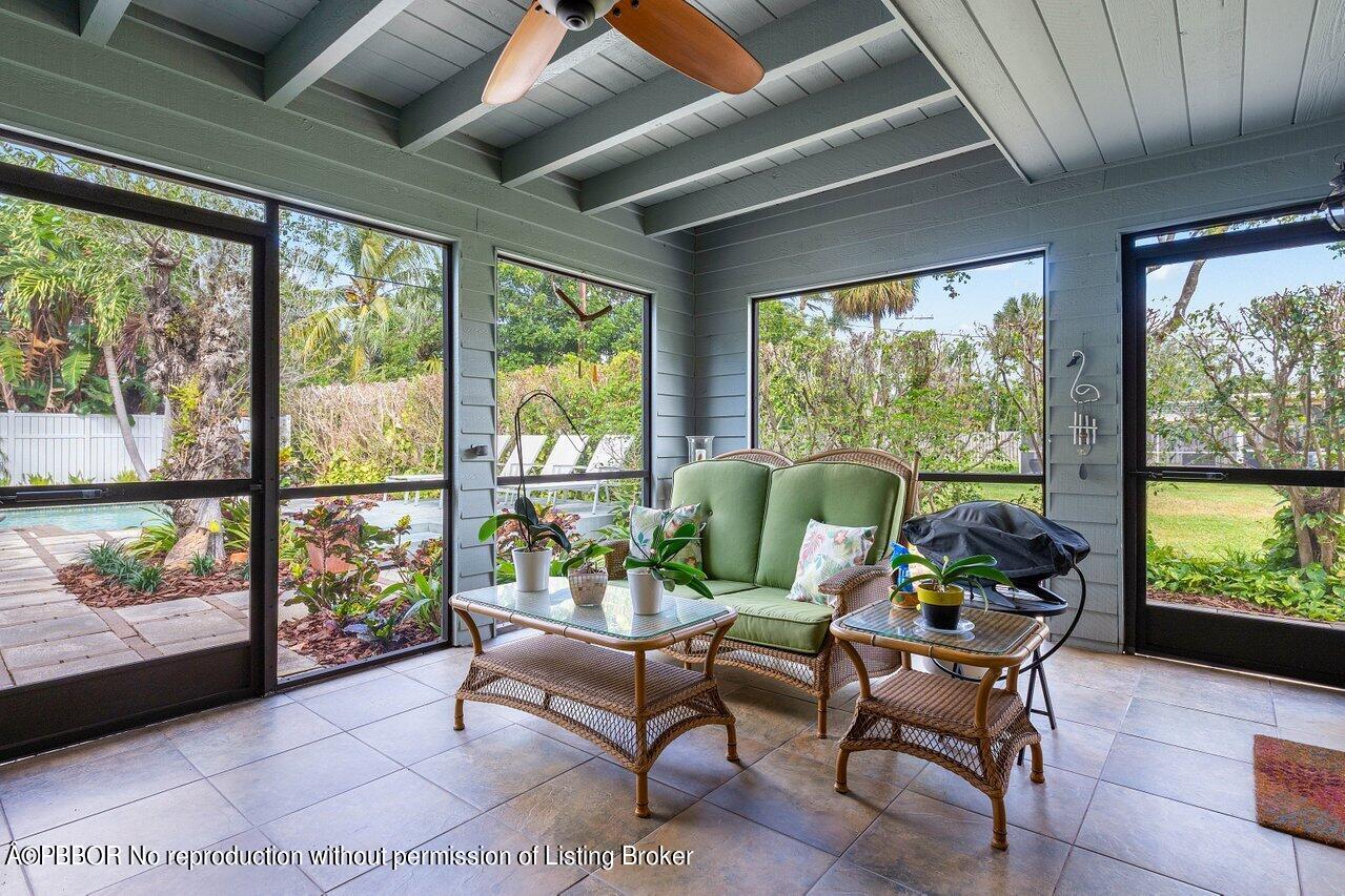 1111 Southwest 19th Street Boca Raton, FL 33486 - Photo 28 of 37 a living room filled with furniture and a potted plant