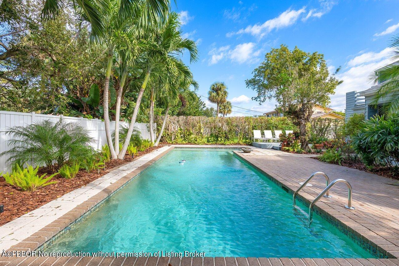 1111 Southwest 19th Street Boca Raton, FL 33486 - Photo 29 of 37 a view of swimming pool with a yard