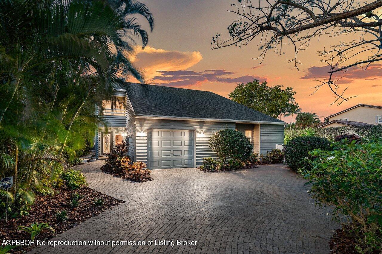 1111 Southwest 19th Street Boca Raton, FL 33486 - Photo 30 of 37 a view of a house with a patio