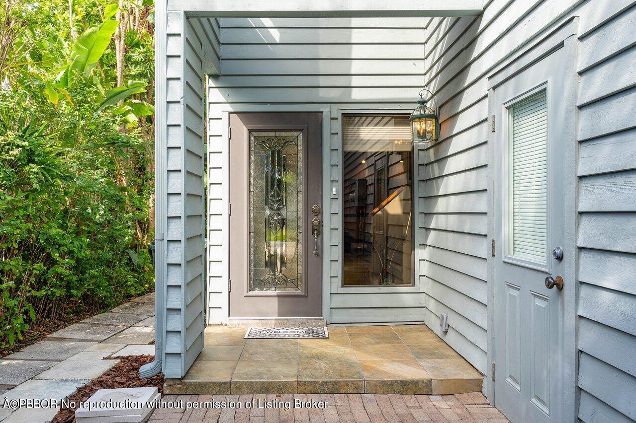 1111 Southwest 19th Street Boca Raton, FL 33486 - Photo 3 of 37 a view of entryway with a outdoor space
