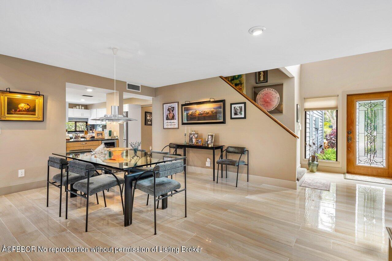 1111 Southwest 19th Street Boca Raton, FL 33486 - Photo 6 of 37 a view of a dining room with furniture and a window