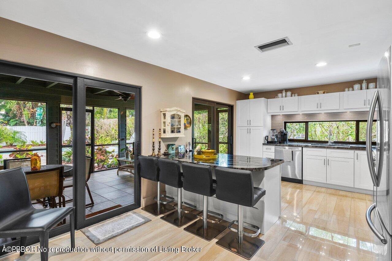 1111 Southwest 19th Street Boca Raton, FL 33486 - Photo 10 of 37 a view of a living room and dining room