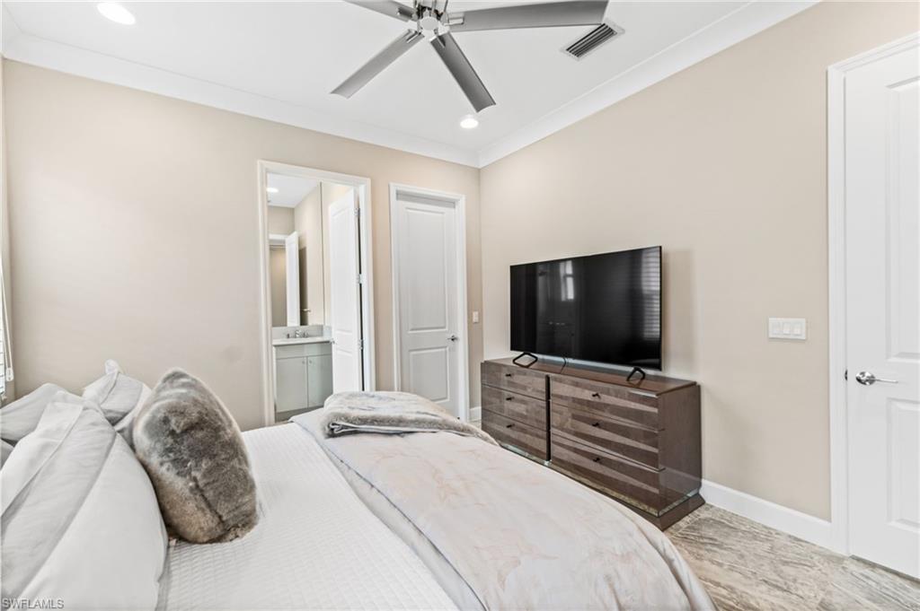 12033 Azalea Way Naples, FL 34120 - Photo 21 of 46 3rd bedroom features ensuite bath