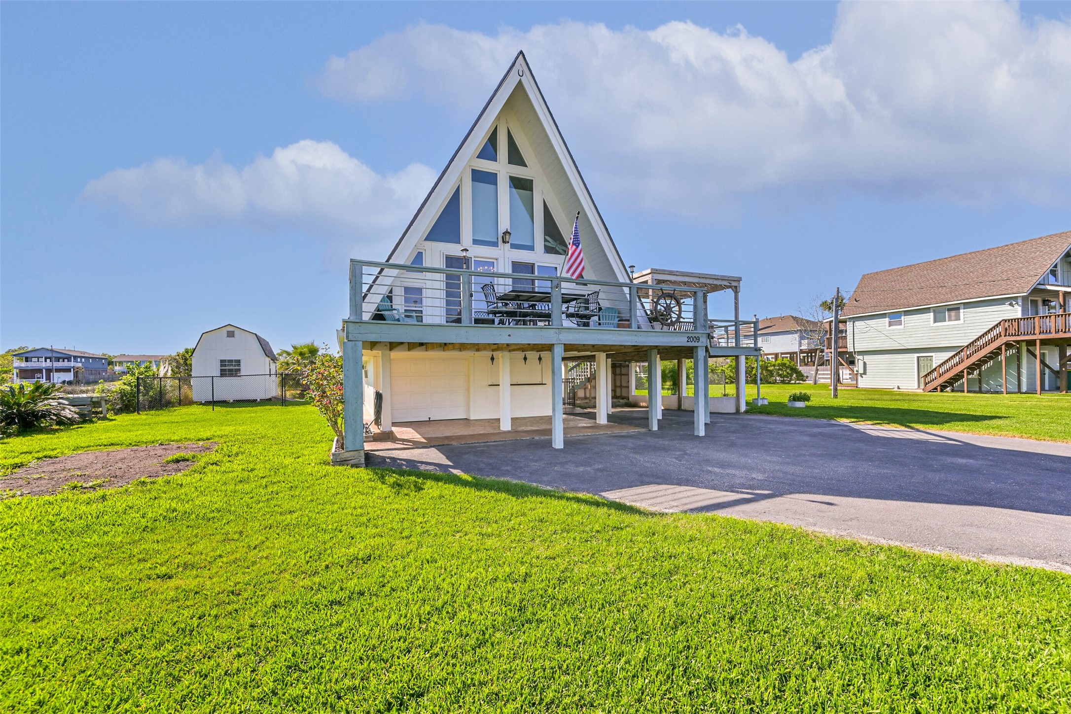2009 Todville Road Seabrook, TX 77586 - Photo 41 of 46 a view of an house with backyard and swimming pool