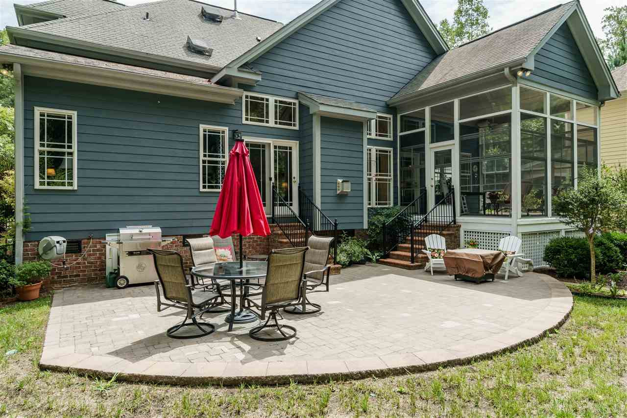 8119 Dreamy Way Raleigh, NC 27613 - Photo 26 of 30 Patio is finished with pavers, a drip sprinkler system in all flower beds, Irrigation system installed in front and back yard with master controls in garage. Automatic hose reels front and back. Back Patio