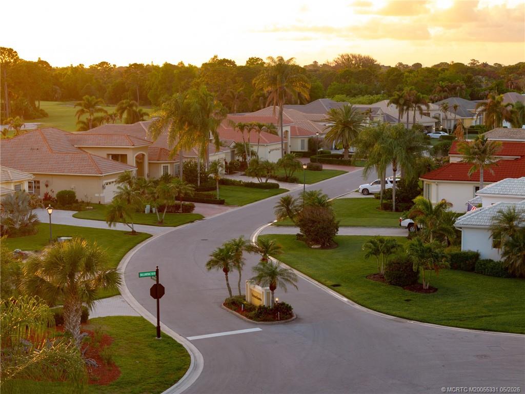 2216 Southeast Stonehaven Road Port St. Lucie, FL 34952 - Photo 53 of 67 an aerial view of a house with garden space and street view