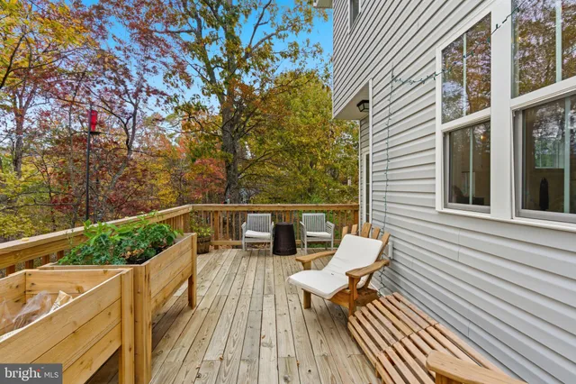 a view of balcony with furniture