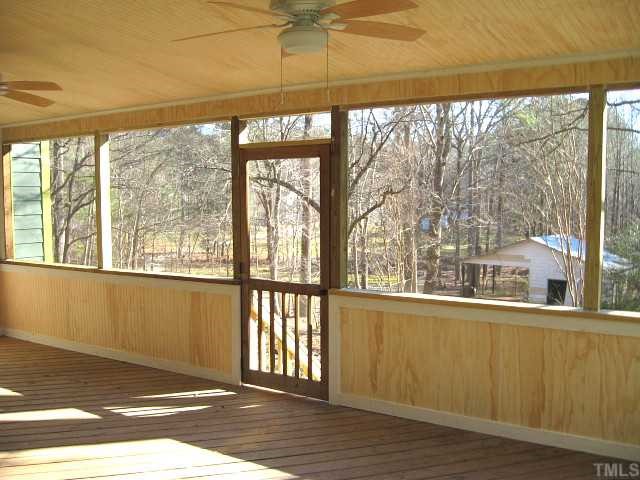13024 Powell Road Wake Forest, NC 27587 - Photo 11 of 12 Huge screened porch with beadboard ceiling & two ceiling fans