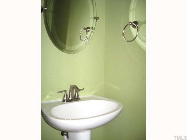 13024 Powell Road Wake Forest, NC 27587 - Photo 5 of 12 Powder room with pedestal sink
