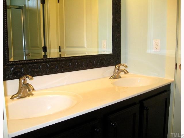 13024 Powell Road Wake Forest, NC 27587 - Photo 9 of 12 Second full bath with dual vanity areas & separate room for shower/toilet