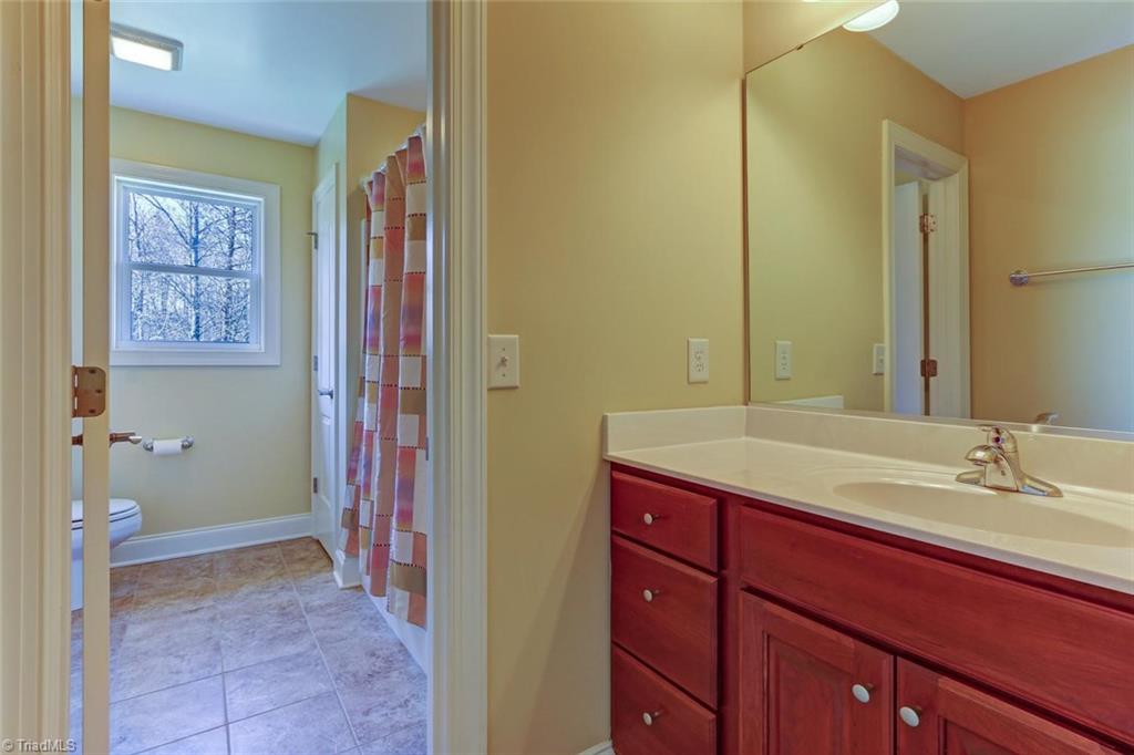 7085 Lanier Road Summerfield, NC 27358 - Photo 19 of 30 Jack & Jill bathroom - between 3rd & 4th bedrooms