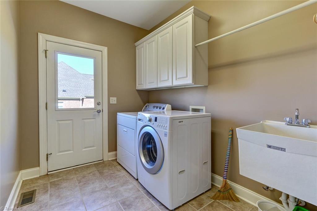 7085 Lanier Road Summerfield, NC 27358 - Photo 23 of 30 Laundry room with side entrance