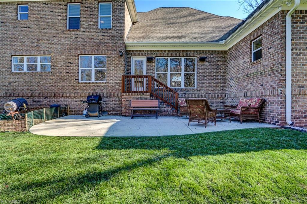 7085 Lanier Road Summerfield, NC 27358 - Photo 25 of 30 Stamped concrete patio