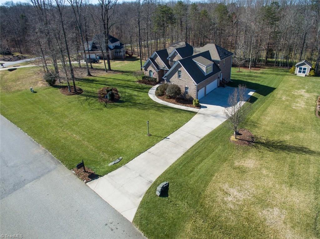 7085 Lanier Road Summerfield, NC 27358 - Photo 30 of 30 Meticulously landscaped and maintained