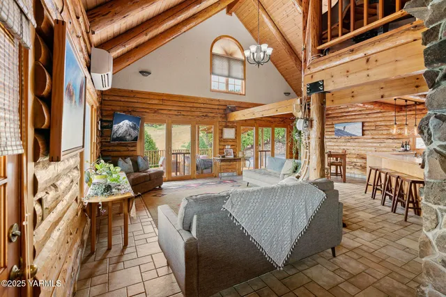 a view of a chairs with a table and chairs in patio