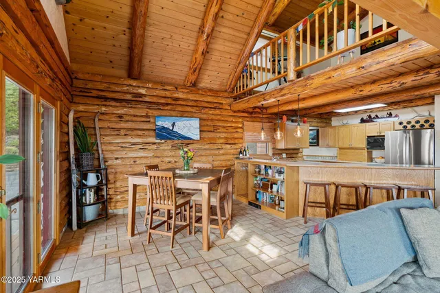 a open kitchen with stainless steel appliances granite countertop a stove and cabinets