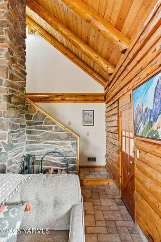 a view of an chairs and table in the balcony