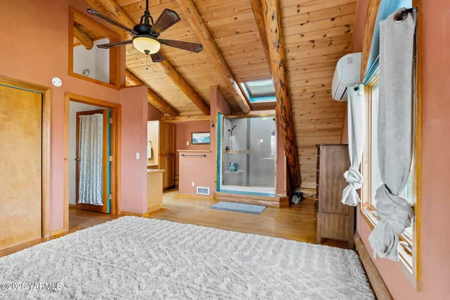 a bathroom with a sink a mirror and a window