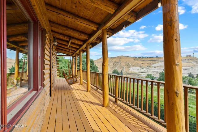 a view of a park with swings and slides