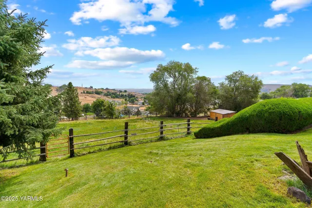 an aerial view of a house with a garden