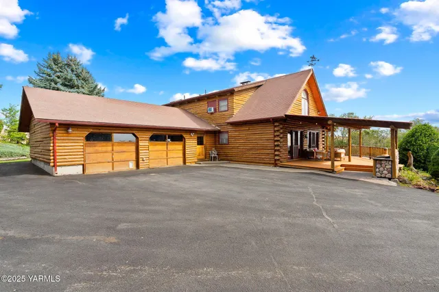 a front view of a house with a garage