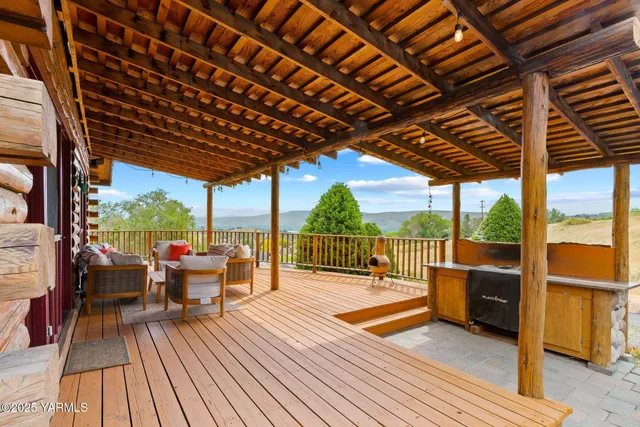 a balcony with wooden floor