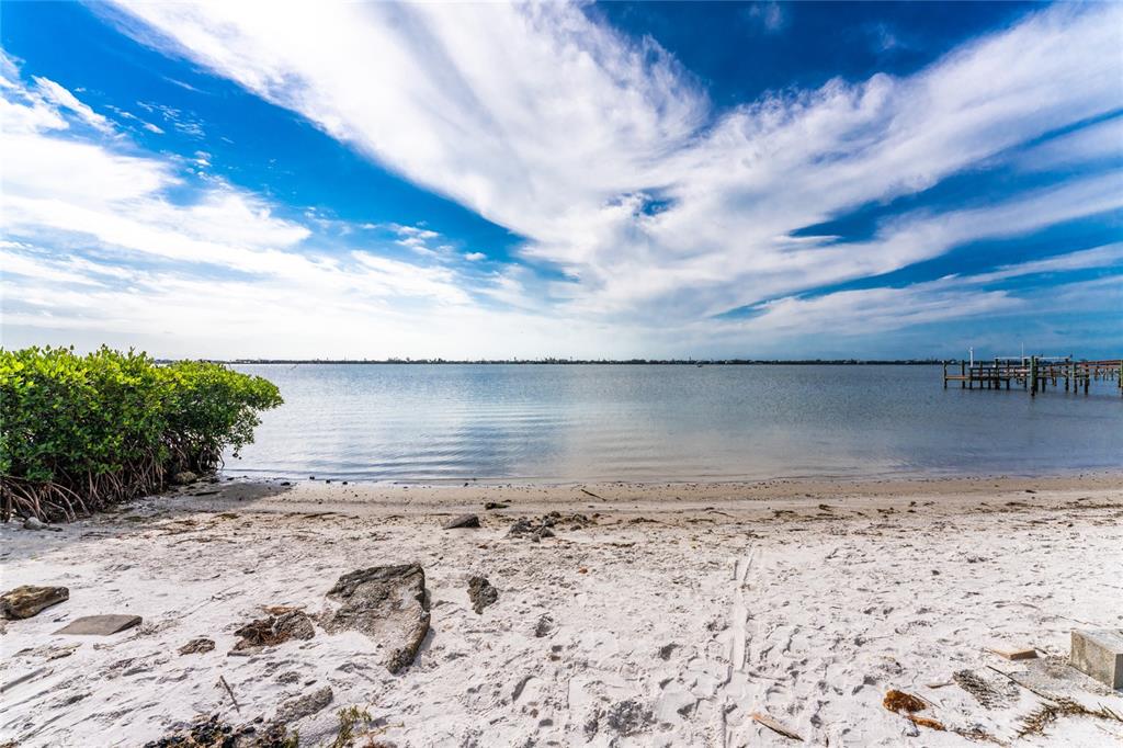 470 South McCall Road, Unit 10 Englewood, FL 34223 - Photo 36 of 57 a view of ocean view with wooden fence