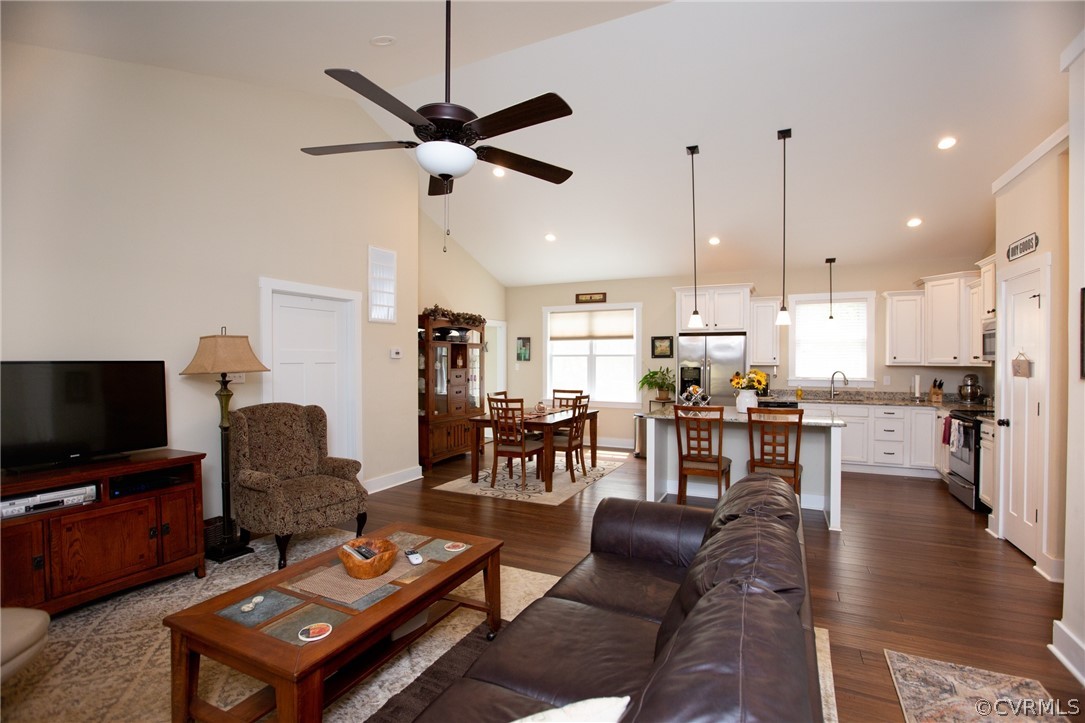 206 Thomas Circle Farmville, VA 23901 - Photo 39 of 40 a living room with furniture a flat screen tv and kitchen view