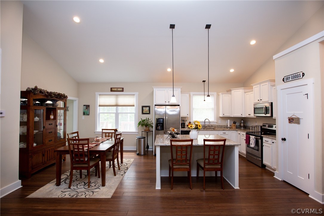 206 Thomas Circle Farmville, VA 23901 - Photo 8 of 40 a view of a dining area with furniture and wooden floor